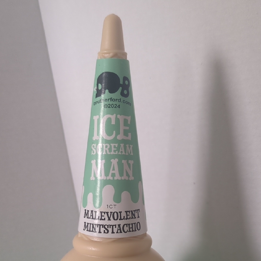 "Malevolent Mintstachio" Green Skull Plastic Ice Cream Cone Holder - Picture 2 of 7